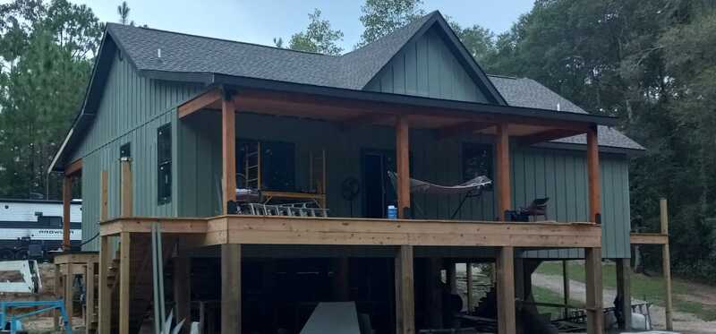 Elevated wraparound porch on custom cabin